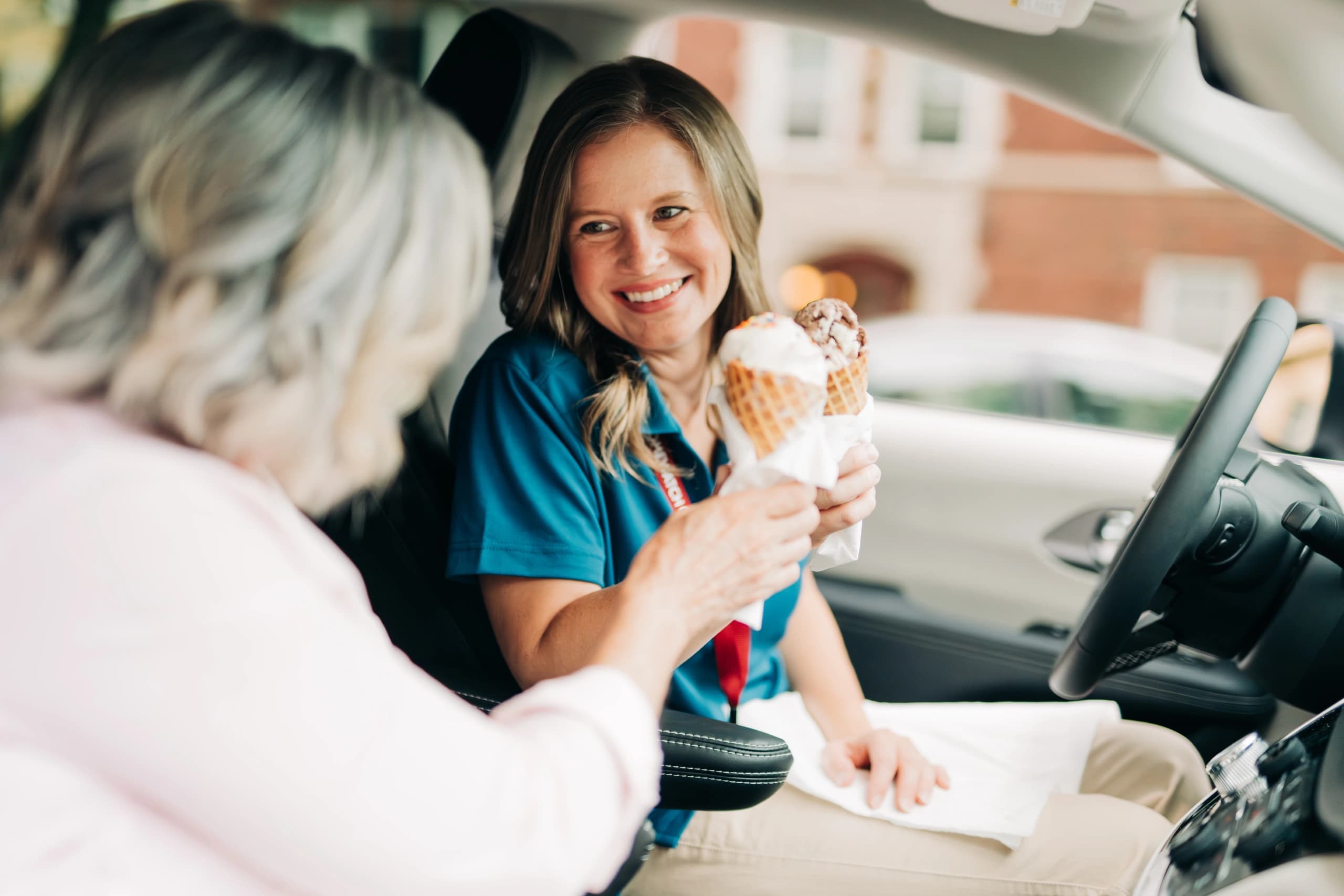 A Homewatch CareGivers caregiver helping a stroke recovery client in Houston